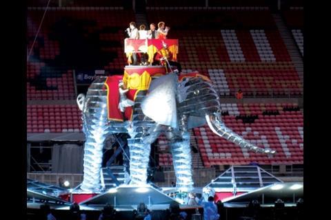 This 7.6m-tall elephant walks 50m to the main stage, where a big top swings up to reveal a 10m-tall ringmaster puppet with 11m-long arms. 